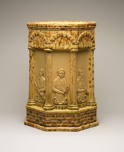 Rockingham “Distin Family Band” garden seat, by Charles Coxon