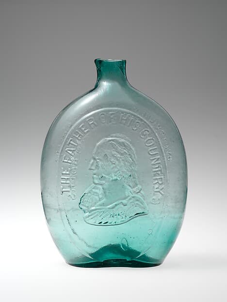 Figured flask, by Dyottville Glass Works