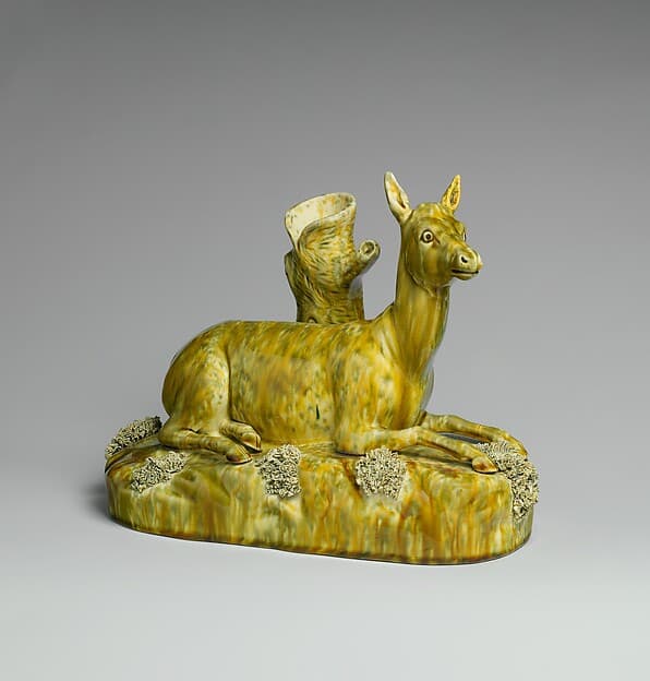 Figural spill vase, by Lyman, Fenton & Co.