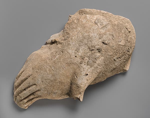 Fragment of a wall decoration with part of a bird