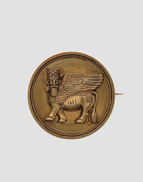 Brooch with Assyrian winged human-headed bull