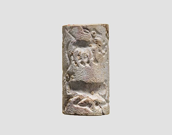 Cylinder seal and modern impression: two horned animals, rosettes