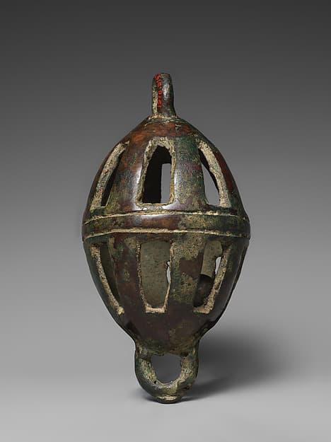 Openwork rattle bell