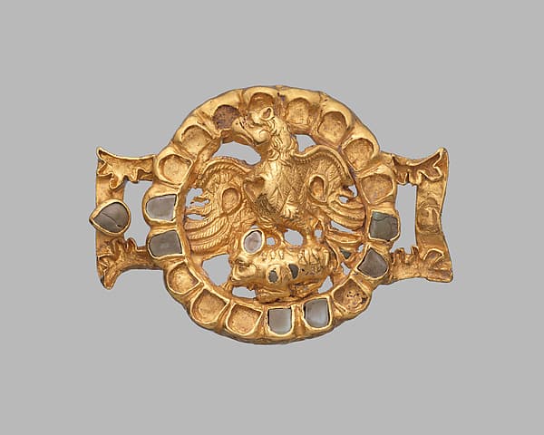 Belt adornment with an eagle and its prey