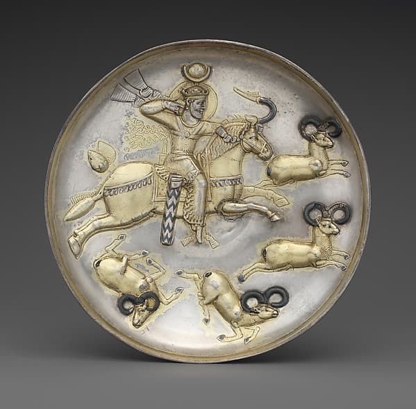 Plate with king hunting rams