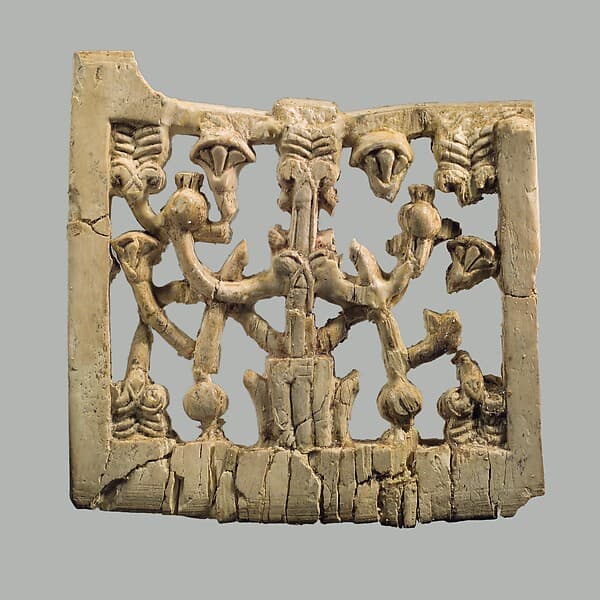 Openwork plaque with papyrus and pomegranates
