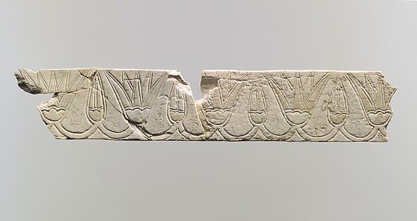 Incised furniture plaque with a frieze of lotus blossoms and buds