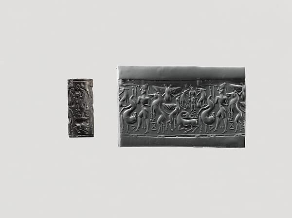 Cylinder seal and modern impression: hunter holding a lion; griffin attacking a stag; Master of Animals; double-headed eagle