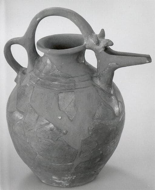 Bridge-spouted jar