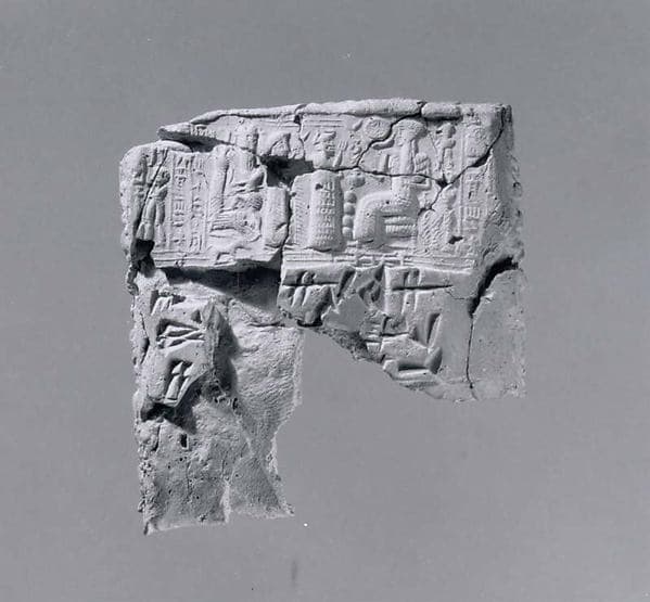 Cuneiform tablet case impressed with four cylinder seals