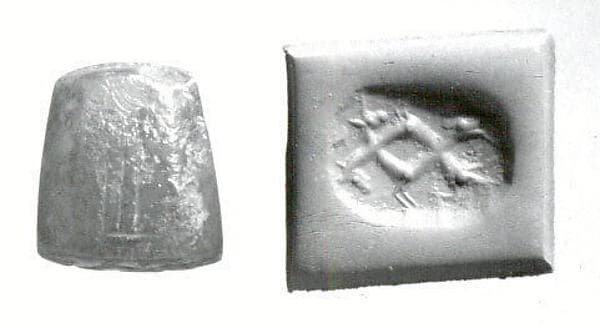 Stamp seal (octagonal pyramid) with animals and divine symbols