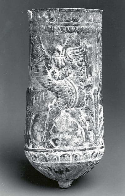Beaker with winged human-headed bulls flanking a stylized tree