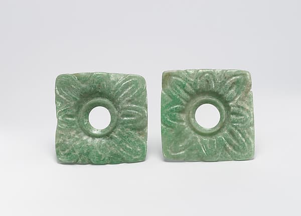 Pair of earflare frontals, by Maya artist(s)