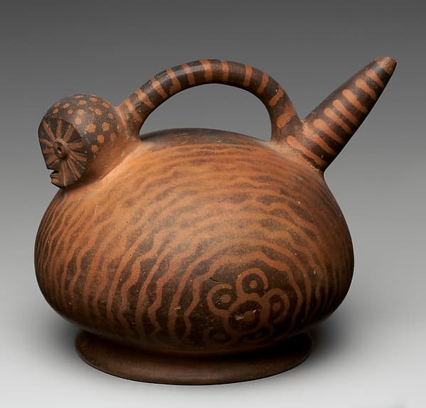 Spout-and-bridge bottle with owl head, by Virú artist(s)