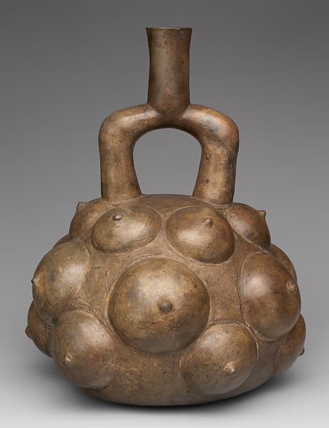 Stirrup-spout bottle with fruits, by Cupisnique artist(s)