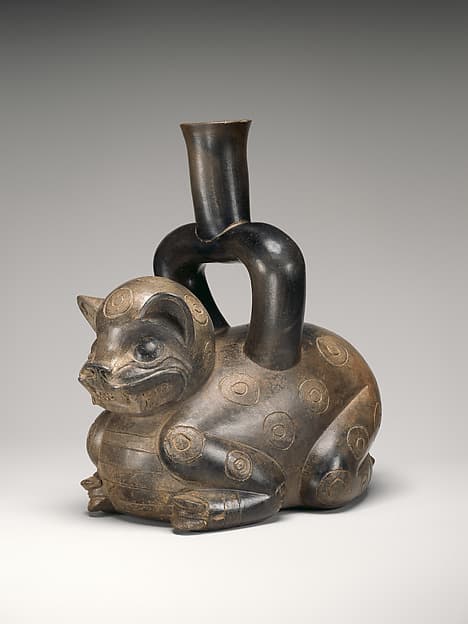 Feline-shaped stirrup-spout bottle, by Cupisnique artist(s)