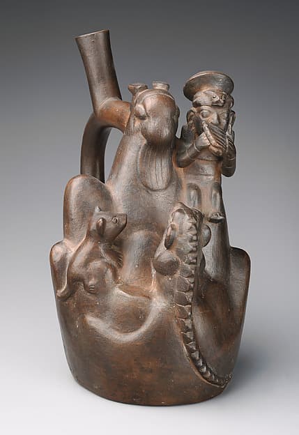 Stirrup-spout bottle with mountain sacrifice scene, by Moche artist