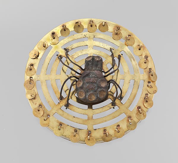 Earflare with spider, by Moche artist(s)