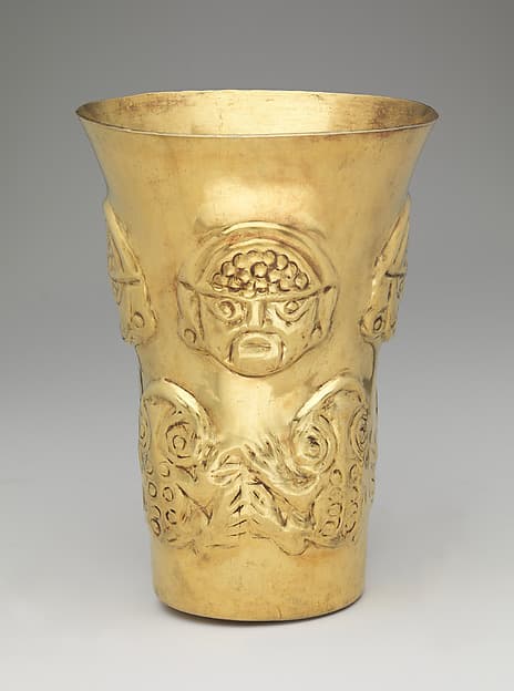 Beaker with heads and toads, by Lambayeque (Sicán) artist(s)