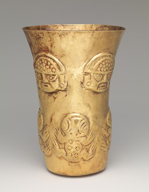Beaker with heads and toads, by Lambayeque (Sicán) artist(s)