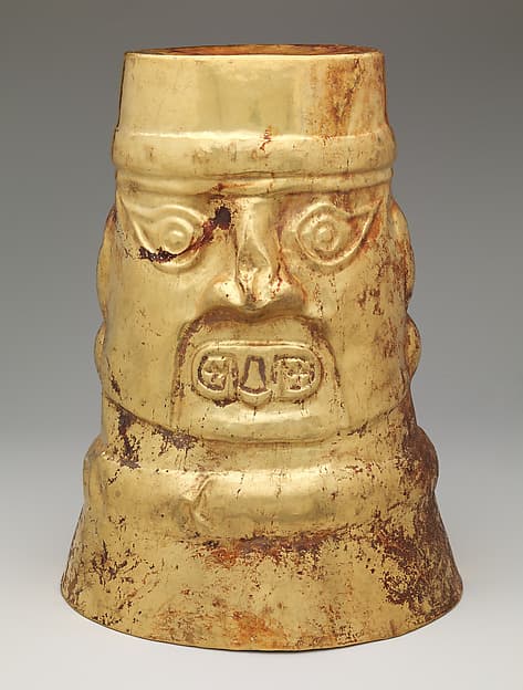 Beaker with inverse face, by Lambayeque (Sicán) artist(s)