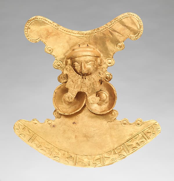 Pectoral with face, by Calima (Yotoco) artist