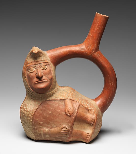 Stirrup-spout bottle with peanut figure, by Moche artist(s)
