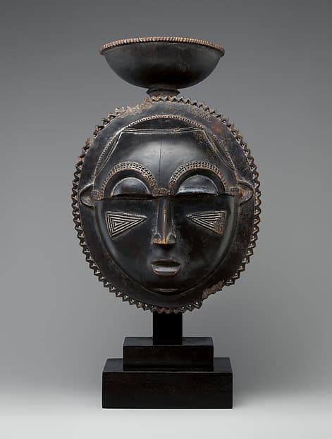 Moon face mask from a mblo performance, by Baule artist