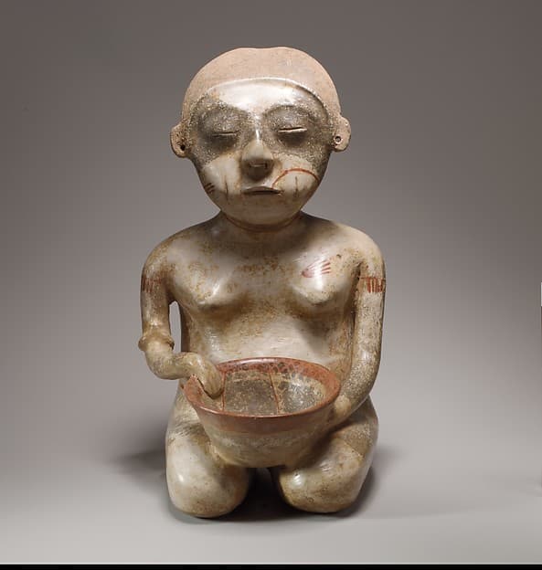 Kneeling female figure, by Lagunillas artist(s)