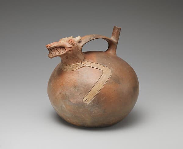 Spout-and-bridge bottle with fox, by Topará artist(s)