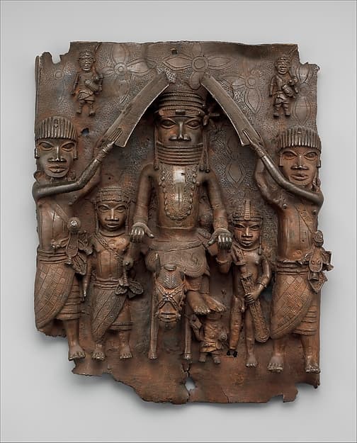 Plaque with equestrian ọ́bà (king) and attendants, by Ìgùn Ẹ́rọ̀nwwọ̀n (brass-casting guild) artists