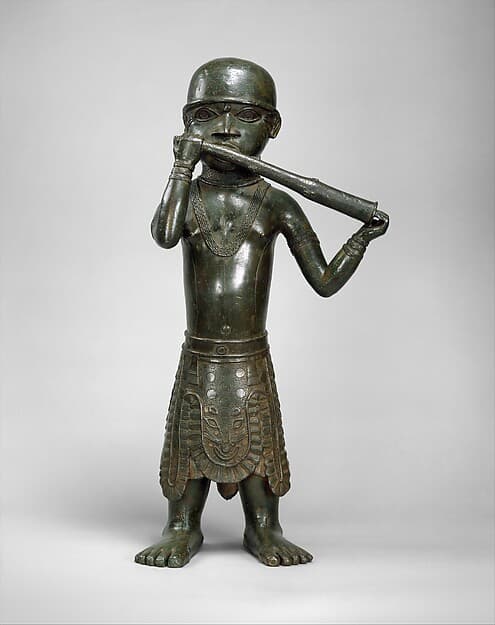 Horn Player, by Ìgùn Ẹ́rọ̀nwwọ̀n (brass-casting guild) artists
