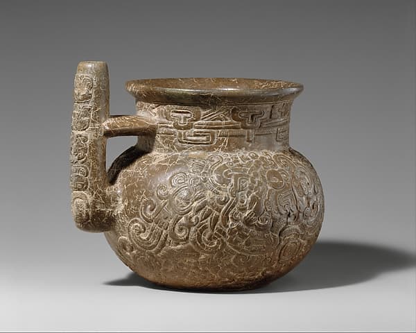 Engraved spouted jar, by Maya artist(s)