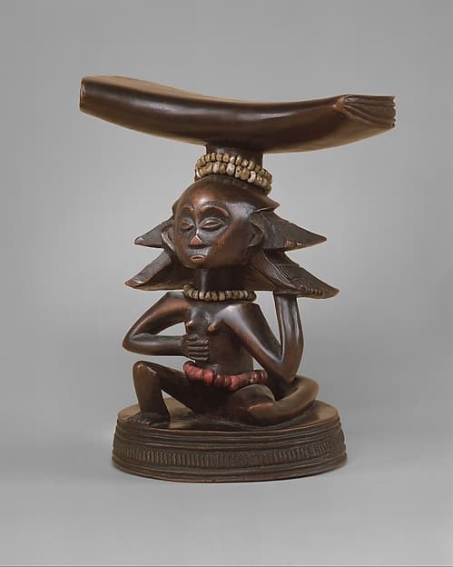 Musamo (headrest), by "Master of the Cascade Coiffure"