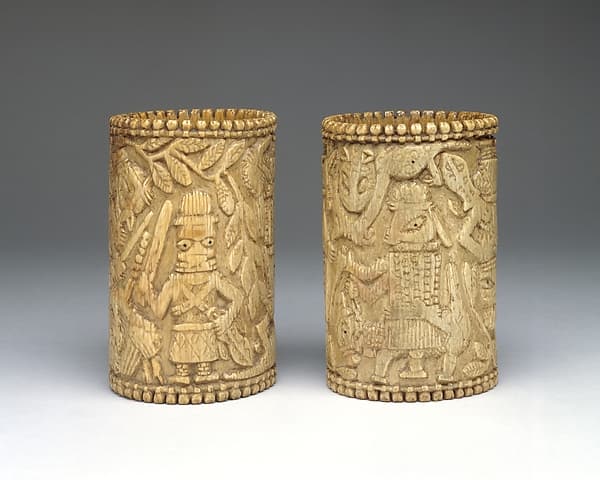 Pair of chiefly bracelets with Portuguese and Edo figures, by Ìgbèsànmwà (ivory- and wood- carving guild) artists