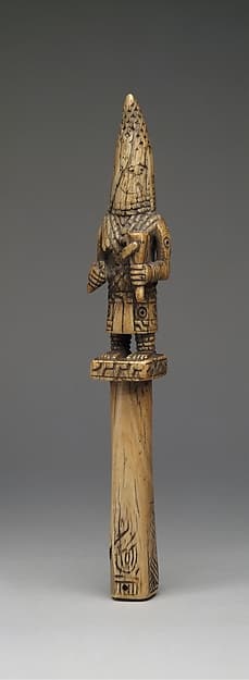 Idiophone with an iyọ́bà, by Ìgbèsànmwà (ivory- and wood- carving guild) artists