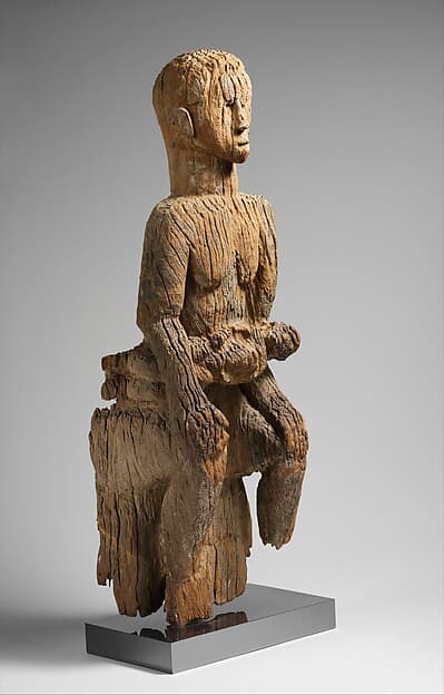 Seated mother and child from an ikoro drum(?), by Mbembe artist