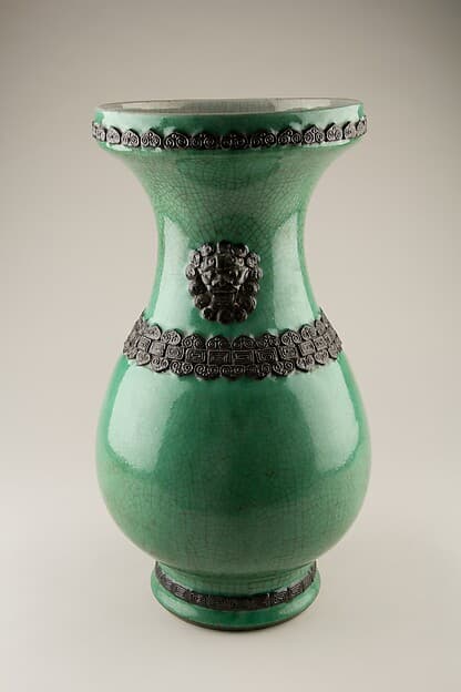 Vase with lion-head handles