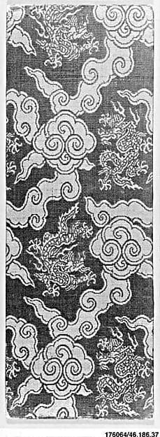 Sutra cover with dragons amid clouds