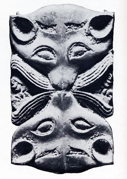 Plaque with Confronted Animal Heads