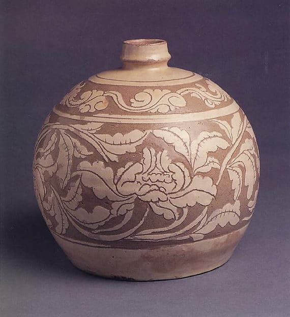 Bottle decorated with peonies
