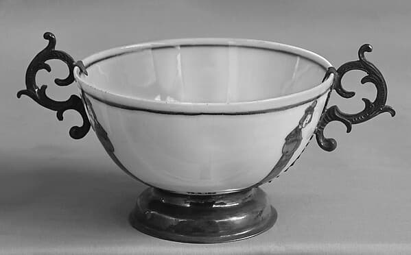 Cup with human figures