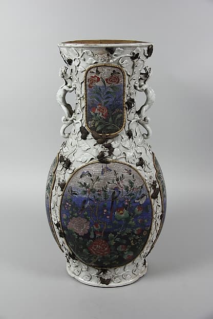 Vase with birds and flowers