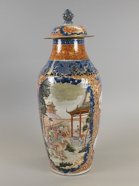 Covered vase with figures in landscape
