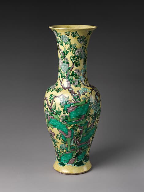 Vase with Rocks and Flowers