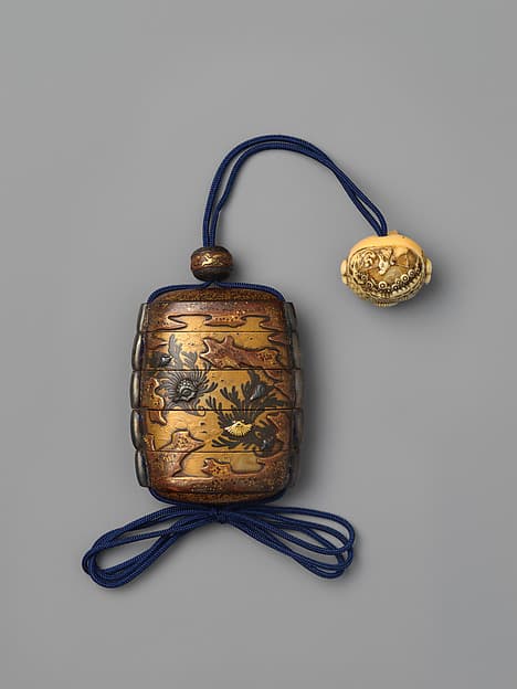 Inrō with Shells and Seaweeds amid Rocks and Waves