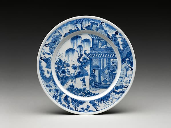 Dish with scene of a family