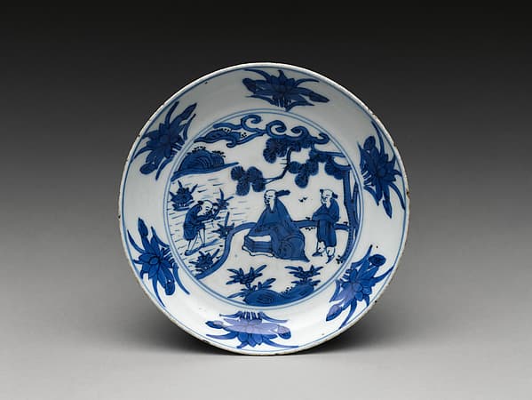 Dish with scholar by a lotus pond