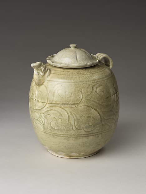Ewer with makara spout with lotus-form cover