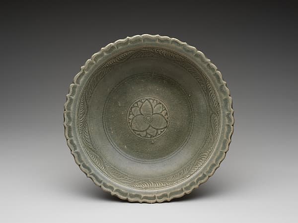 Dish green glazed with floral medallion and foliate rim